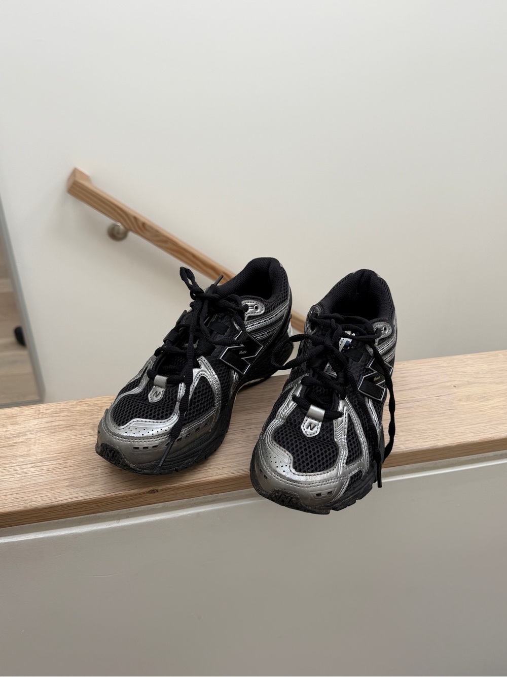 New Balance Black and Silver Lace-Up Sneakers